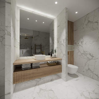 Luxurious bathroom with marble walls and floors, a floating wood vanity, vessel sink, large mirror, and warm ambient lighting.